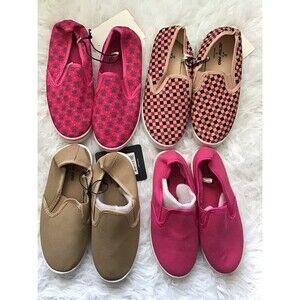 4 Pairs of girls slip on sneakers. Size small. New with tags.